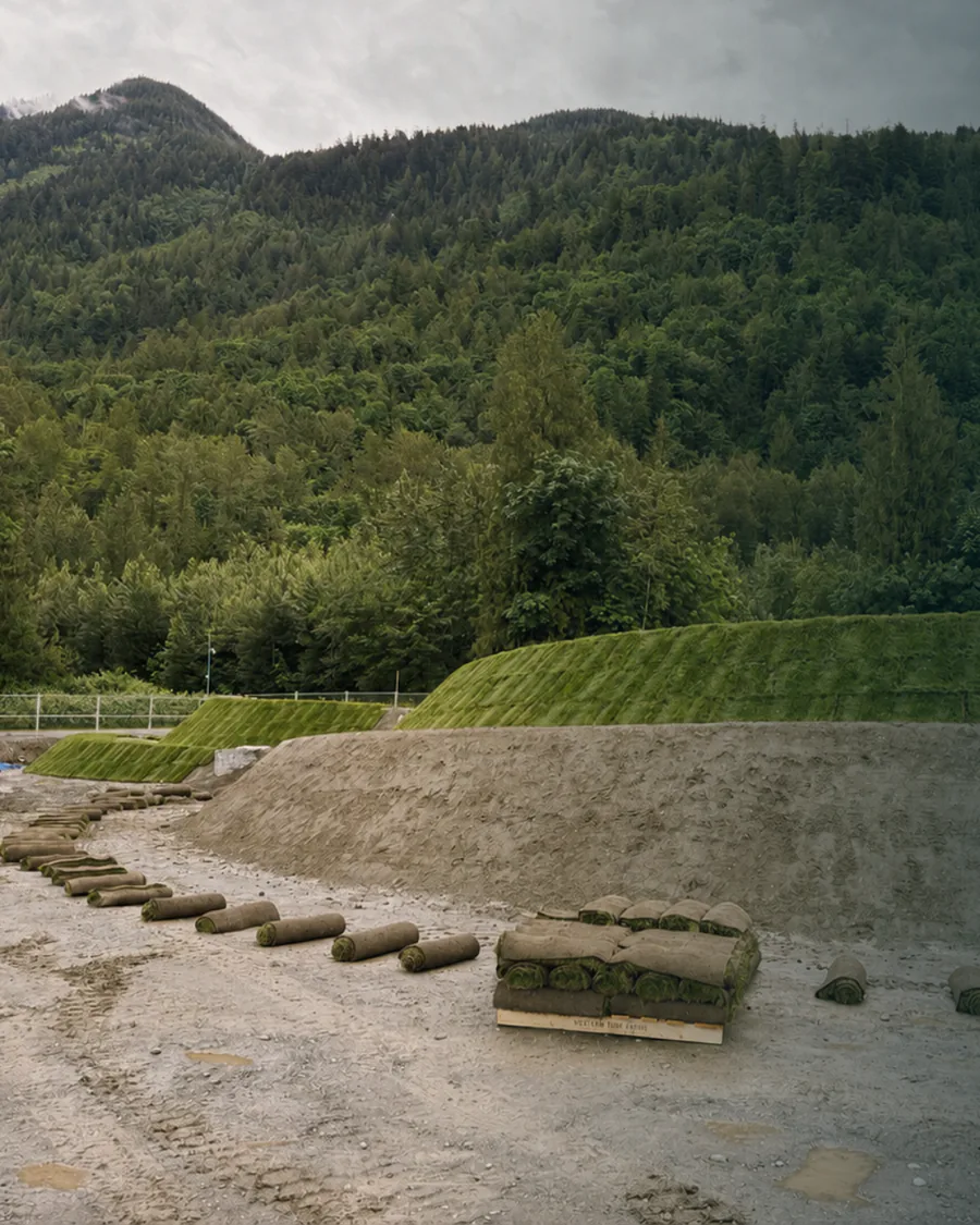 Wave pool construction beneath forested mountains